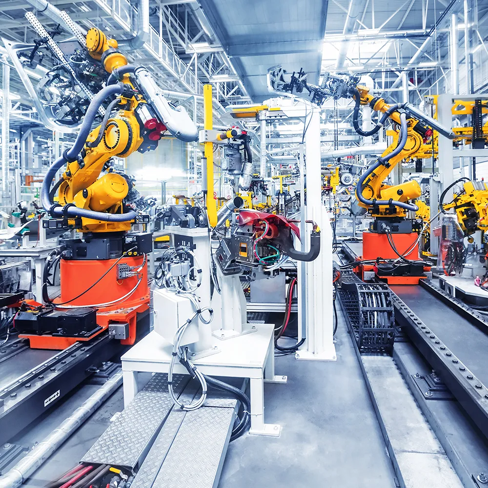 Yellow robots in industrial building